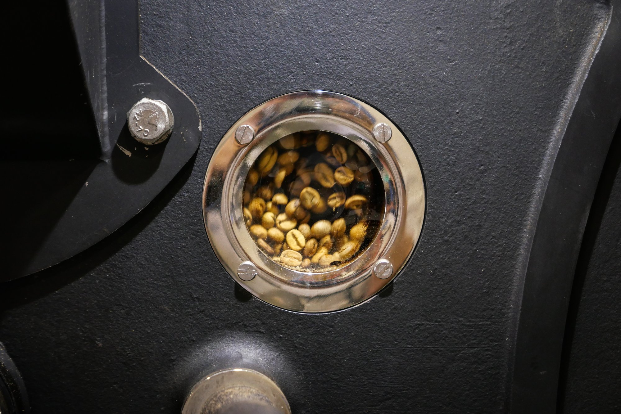 Beans seen through the roaster's sight glass